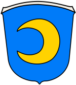 Wappen Gemeinde Halbemond In diesem Bild sehen Sie das Wappen der Gemeinde Halbemond. Der Hintergrund ist blau. Im Vordergrund befindet sich ein gelber Halbmond.